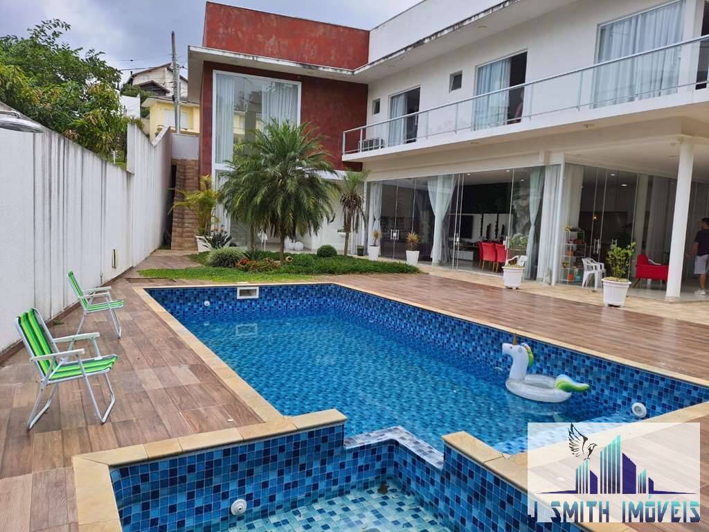 Casa de Condomínio à venda com 4 quartos, 398m² - Foto 1