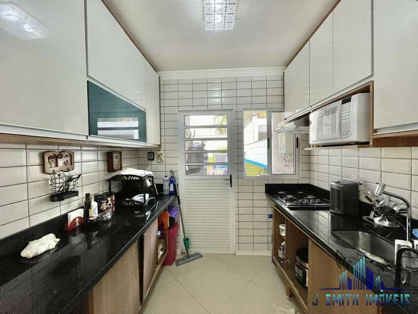 Casa à venda com 3 quartos, 100m² - Foto 4