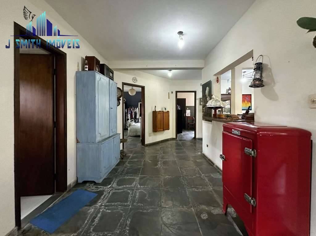 Casa à venda com 4 quartos, 303m² - Foto 11